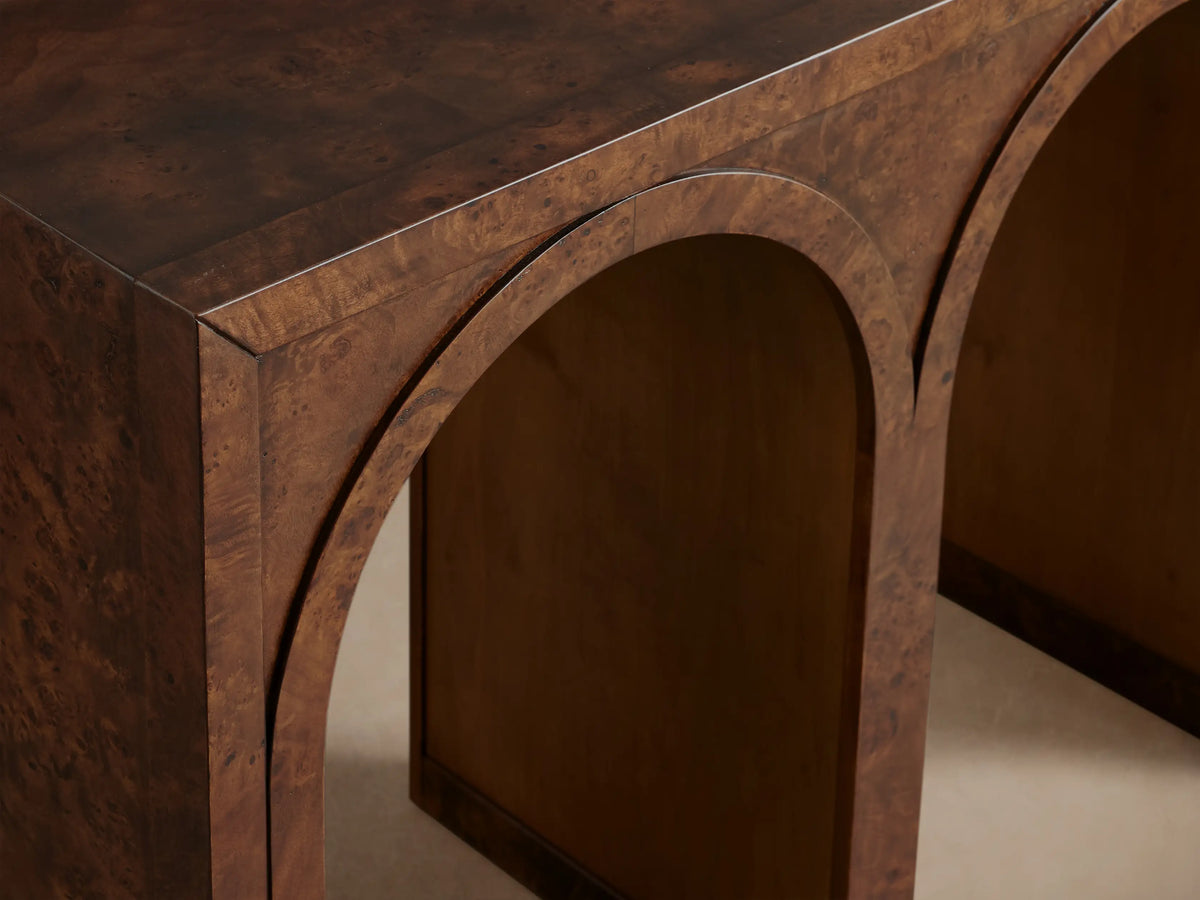 Hattie Burl Console Table: textured brown burl wood with three arches, dark top, and lighter contrasting arch interiors.
