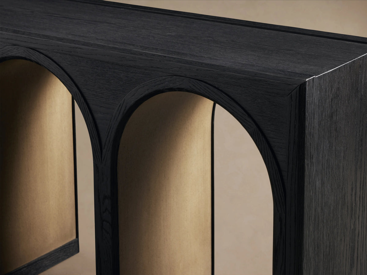 Hattie Console Table made of dark oak wood with contrasting light interior arches, showcasing detailed wood grain.