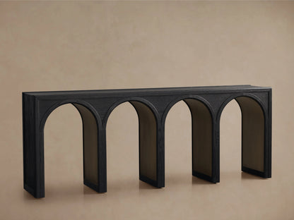 Hattie Console Table made of solid oak wood with a black finish. Features five arch-shaped legs with contrasting interiors.