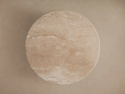 Hemmings Stone Nesting Coffee Table; round, beige stone tabletop with natural veining and subtle sheen, viewed from above.