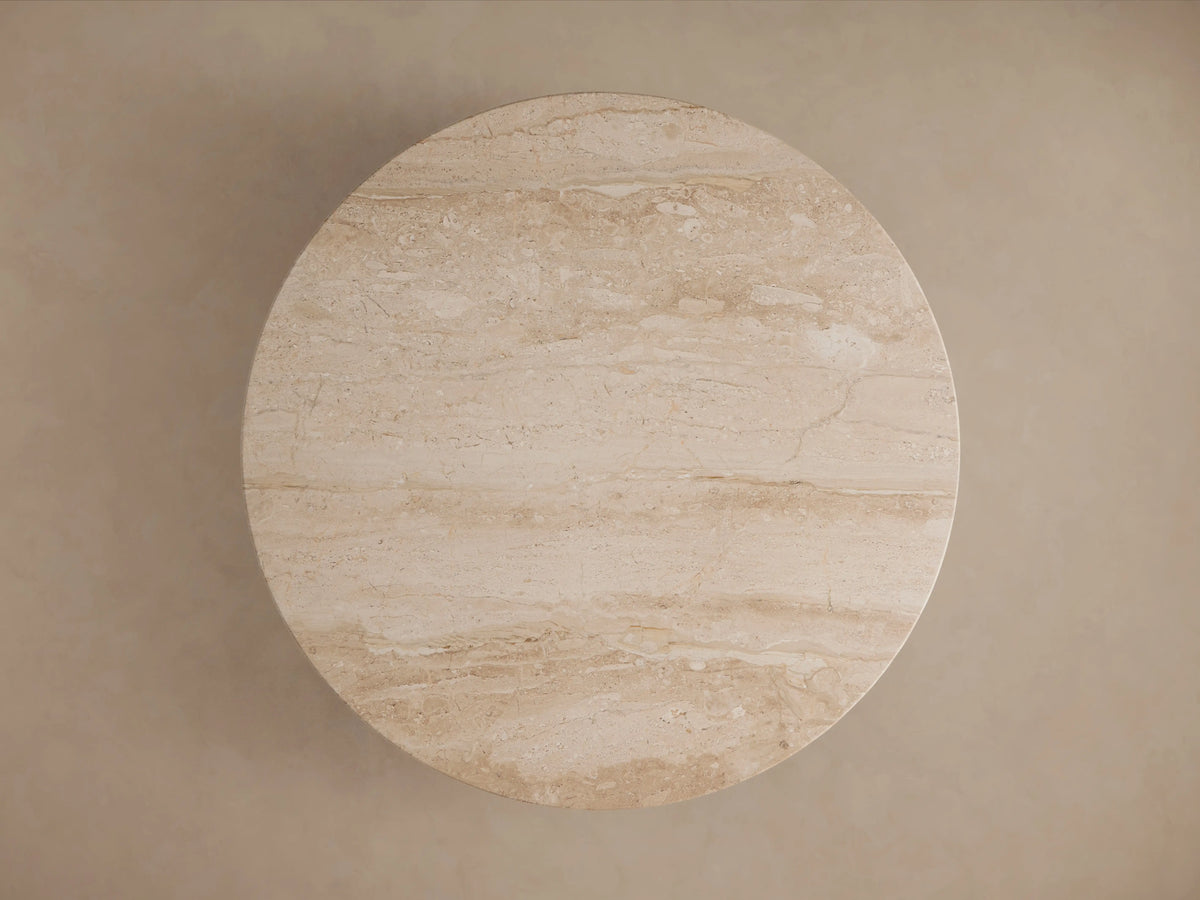 Hemmings Stone Nesting Coffee Table: Circular beige coralle marble tabletop with natural cream veining, seen from directly above.