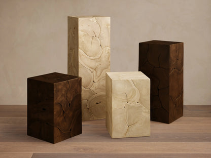Kalmar Pedestal made of natural teak wood featuring organic shapes, visible cracks, knots, and swirling grain patterns on its smooth surface.