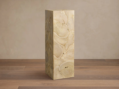 Kalmar Pedestal made of natural teak wood, with visible organic patterns, cracks, and patina, against a neutral background.