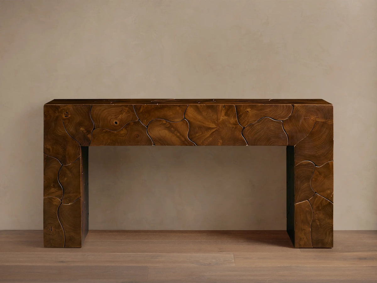 Kalmar Console Table with a close-up of its textured wooden surface, showcasing natural wood grain patterns in a rich brown finish.