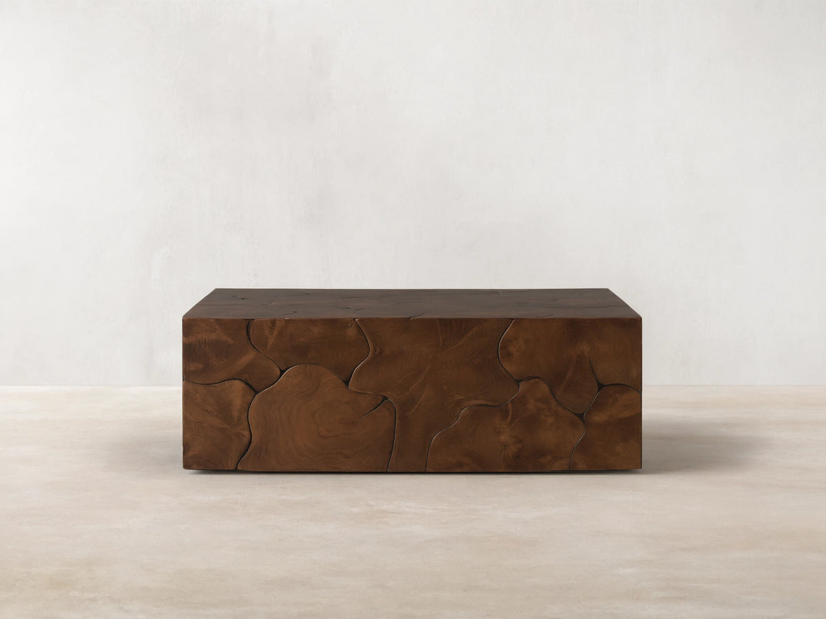 Kalmar Square Coffee Table made of natural teak wood, featuring unique organic shapes and visible knots on its surface.