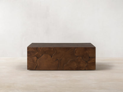 Kalmar Square Coffee Table made of natural teak wood, featuring unique organic shapes and visible knots on its surface.
