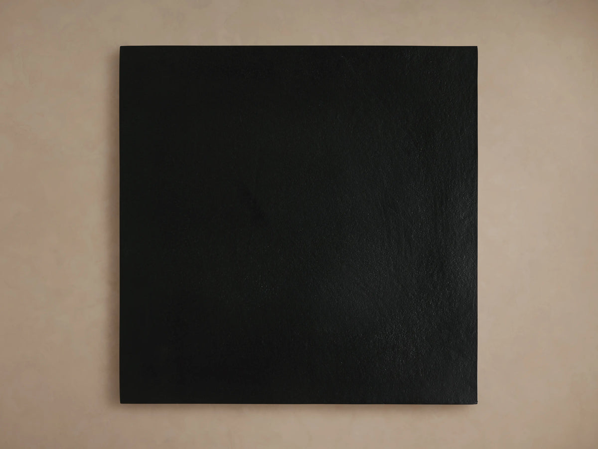Kavali Square End Table in a black finish with a smooth, flat surface. Positioned against a neutral background.