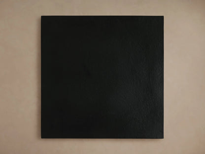 Kavali Square End Table in a black finish with a smooth, flat surface. Positioned against a neutral background.