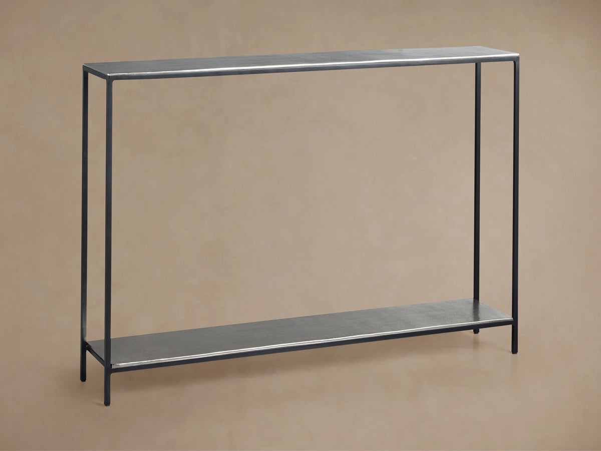 Kavali Slim Console Table with black powder-coated iron frame, featuring a minimalist design with slender legs and rectangular shelves.