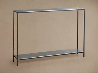 Kavali Slim Console Table with black powder-coated iron frame, featuring a minimalist design with slender legs and rectangular shelves.