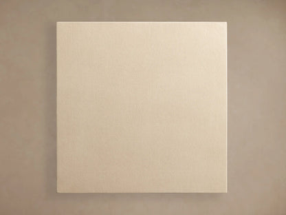 Malone Square Plinth End Table, light beige shagreen textured cube with a thin brass base, against a neutral wall & wood floor.