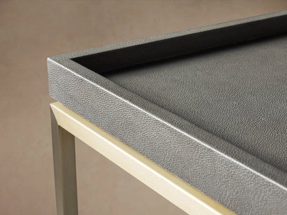 Malone Coffee Table corner, showcasing engineered hardwood top with shagreen pattern, set on a steel base with matching finish.