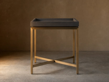 Malone End Table. Square dark gray shagreen leather-look top on a gold steel base with an X-shaped crossbar.