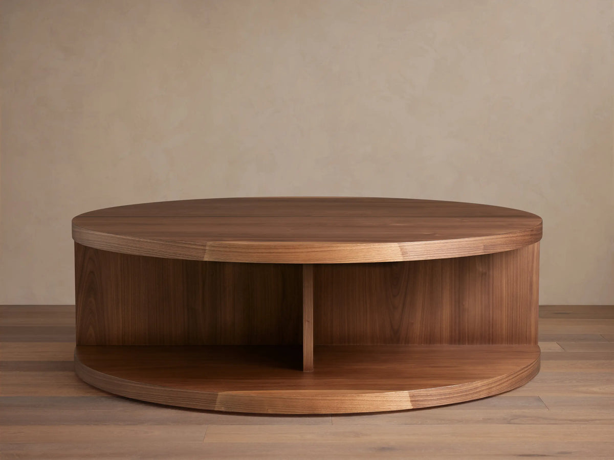 Mihaela Round Coffee Table made of Romanian oak and spruce, showcasing circular wooden top and base with a mid-section support.