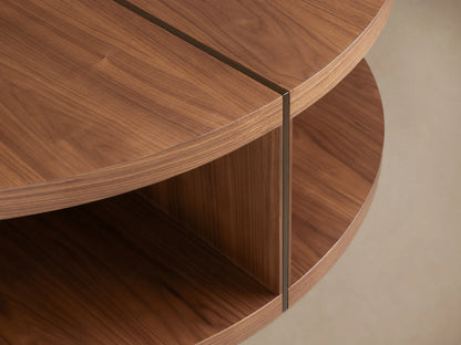 Round coffee table with a smooth wooden surface and two-tier design. Made of Romanian oak with visible wood grain and a central divider.
