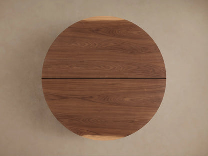 Mihaela Round Coffee Table in Romanian oak with visible wood grain, featuring metallic brass accents and multi-level design.