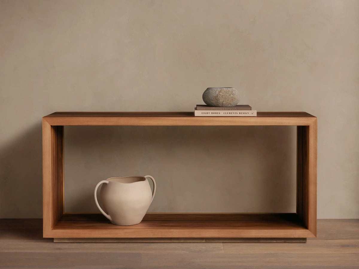 Mihaela Console Table made of Romanian oak with a natural finish, featuring a minimalist design. A vase and books are on top.