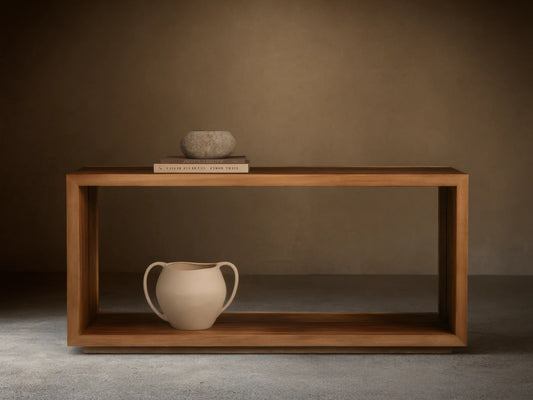 Mihaela Console Table made of Romanian oak with a natural finish, featuring a minimalist design. A vase and books are on top.