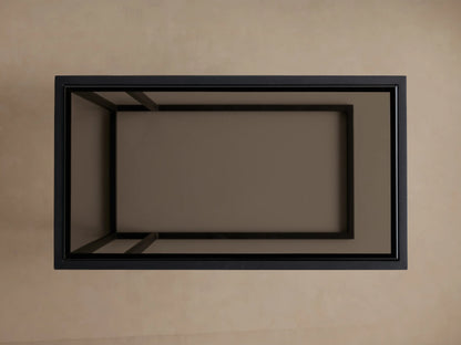Top-down view of a rectangular Mills Glass C Table with matte black steel frame and dark glass top on a light brown background.