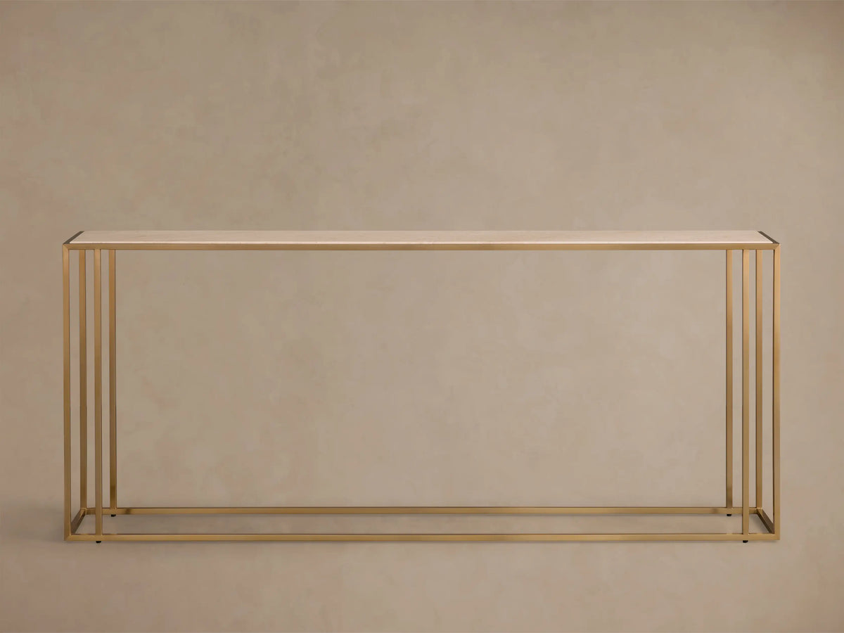 Front view of the Mills Stone Console Table with a light beige stone top and antique brass-finished steel frame.