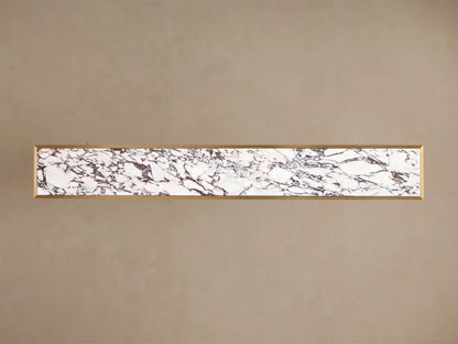Front view of the Mills Stone Console Table with white marble top, grey veining, and antique brass-finish steel legs.