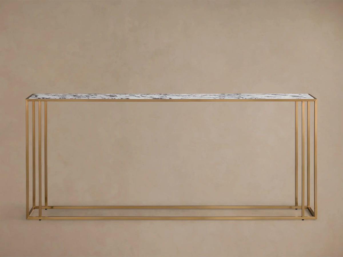Top-down view of the Mills Stone Console Table, featuring a white stone top with dark purple veining within an antique brass frame.
