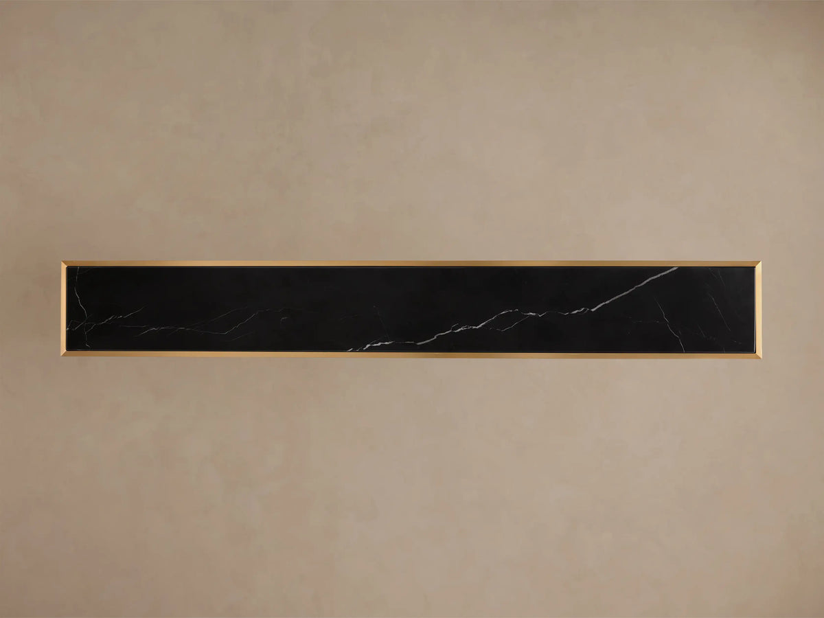 Top-down view of the Mills Stone Console Table, featuring a rectangular black stone top with white veining and a gold frame.