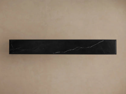 Front view of the black Mills Stone Console Table, featuring a black marble top with delicate white veining.