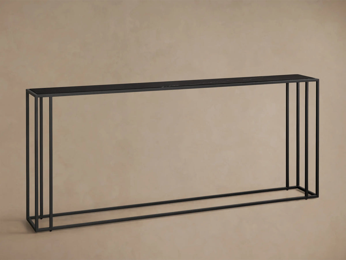 Front view of the black Mills Stone Console Table, featuring a matte black metal frame and a black stone top.