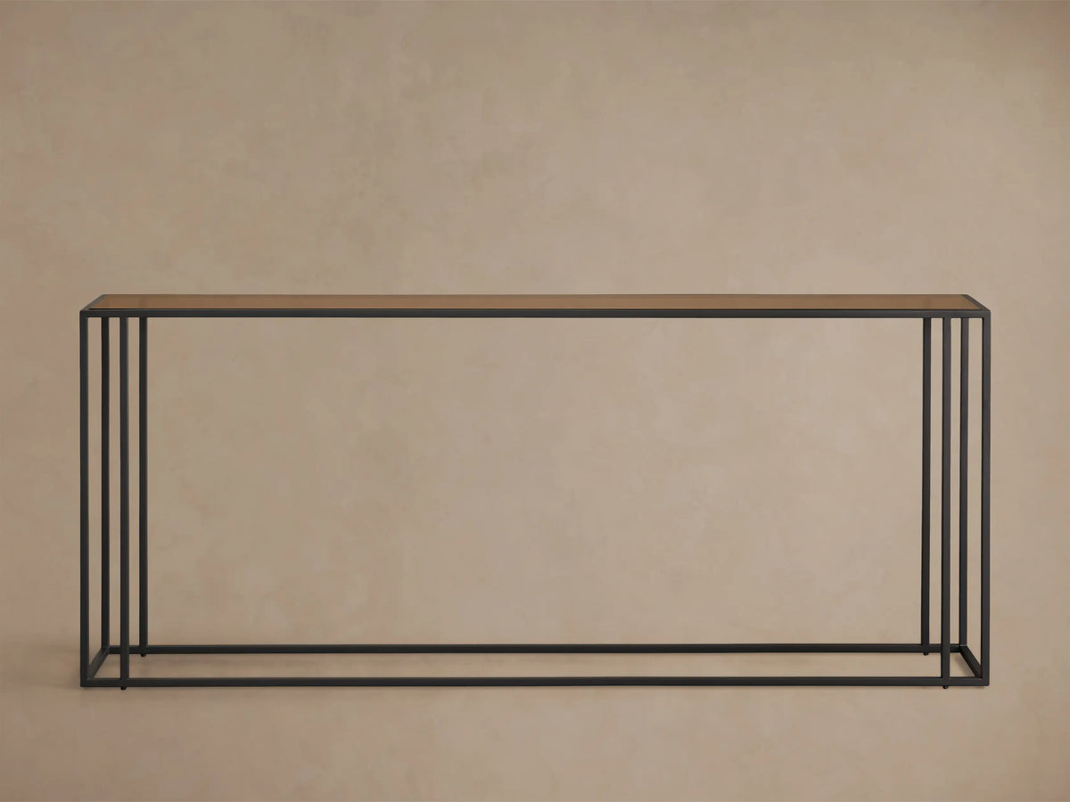 Front view of a Mills Glass Console Table with a brown-tinted glass top and a black powder-coated steel frame.