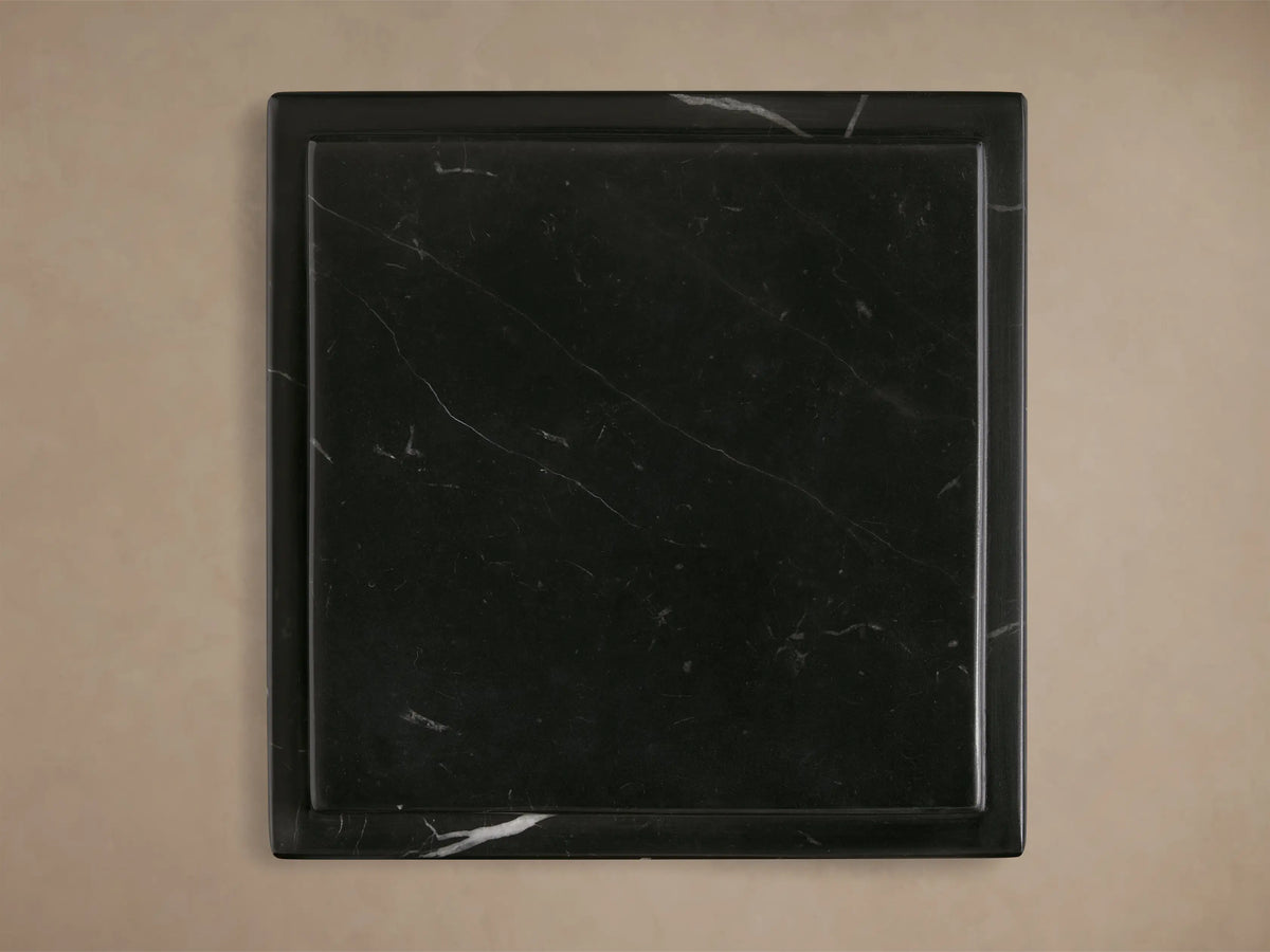 Group of three Black Marmont Pedestals with natural white marble veining. Rectangular forms with stepped, layered tops.