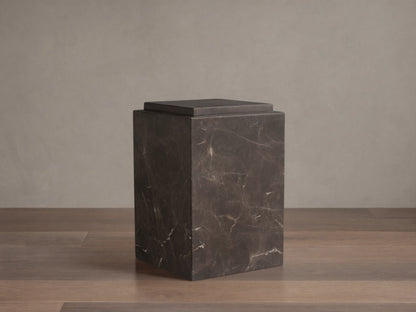 Handcrafted Marmont Pedestal made of natural dark marble with unique veining, matte lacquer finish, on a wooden floor.