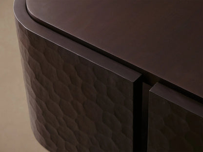Dark mahogany chiseled coffee table with a rectangular top, lower shelf, and textured, hand-carved curved legs.