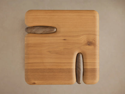 Close-up of the light brown wooden piece's top surface and curved leg, showing smooth rounded edges and natural wood grain.