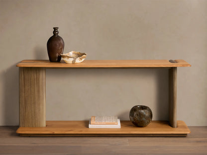 Front view of the Nolito Console Table. Two-toned wood, with light brown rounded shelves and darker curved supports.