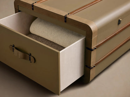 Side view of the olive Oberlin Storage Coffee Table with an open drawer, showing beige leather trim and handle details.