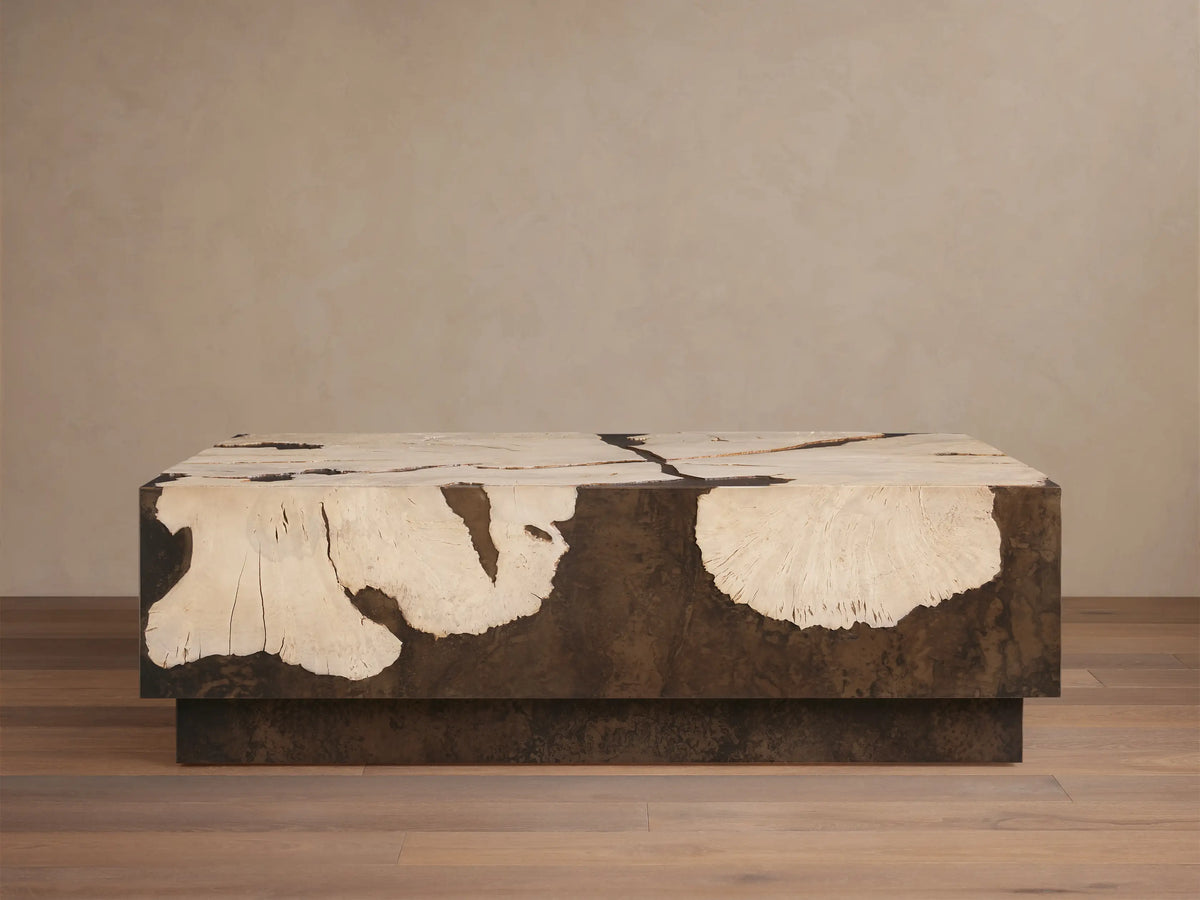 Obra Coffee Table: low, square, light sun-bleached milpa burl wood with natural patterns, dark weathered steel base.