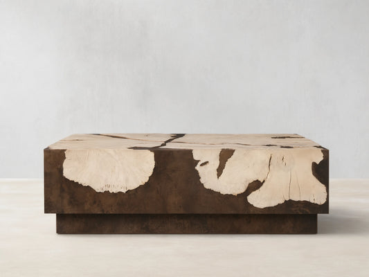 Obra Coffee Table: low, square, light sun-bleached milpa burl wood with natural patterns, dark weathered steel base.