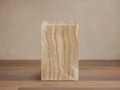 Grey Onyx Stool, rectangular block, wavy natural stone patterns in earthy brown, tan, yellow, and subtle grey.
