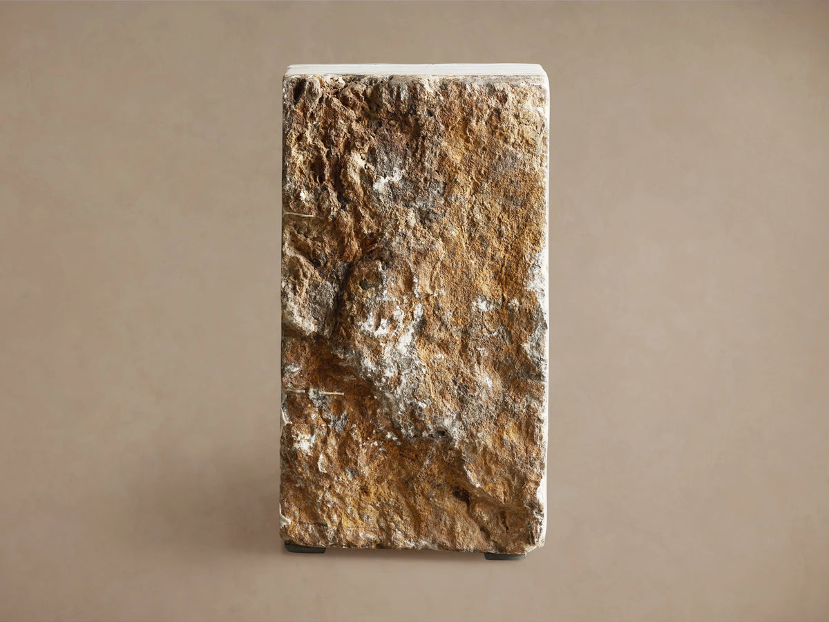 Solid Onyx Stool with natural brown, beige, and white striations; textural raw edges visible on the top and sides.