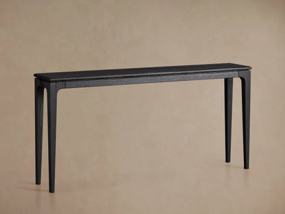 Park Console Table with a sleek design in rich ebony finish, rectangular top, four tapered legs, on wooden floor.