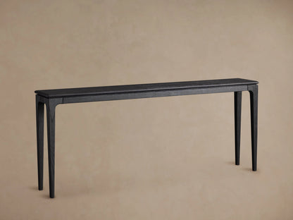 Park Console Table made of ash wood with a rich ebony finish, features sleek lines and a rectangular top, placed on wood floor.