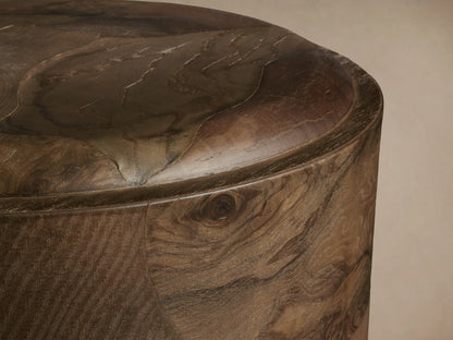 Polanco Round Plinth End Table, dark natural wood with oyster-cut fragments, cylindrical shape, on a weathered metal base.