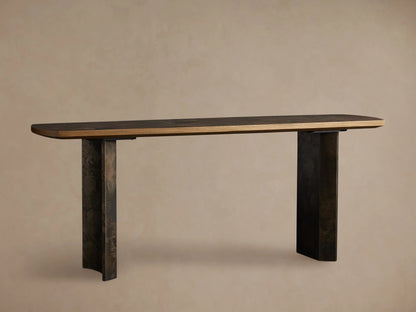 Polanco Console Table with a dark wooden top and two slightly textured steel legs, shown against a neutral background.