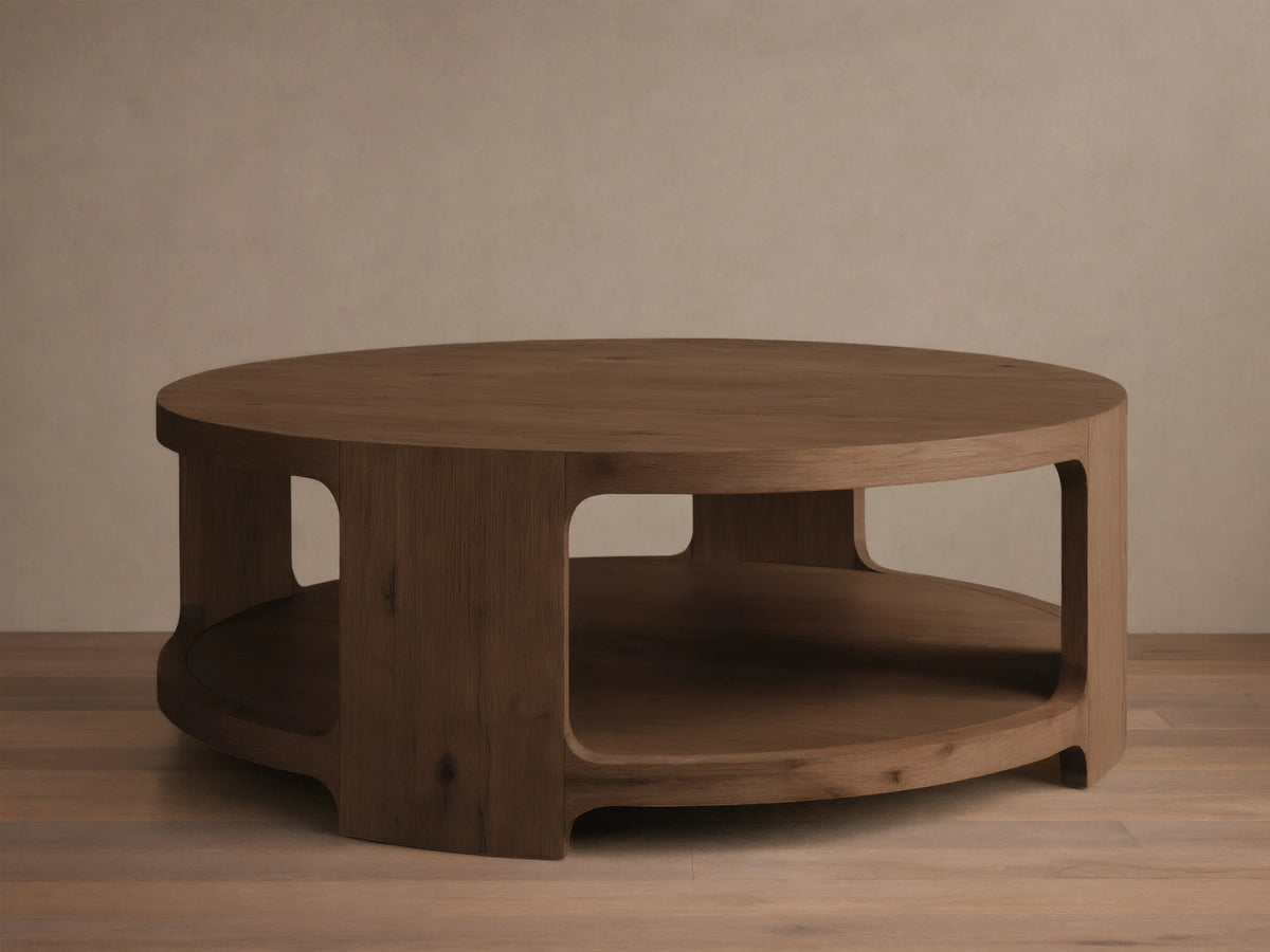 Front view of the Redding Round Coffee Table, a round table crafted from stained white oak, with a lower storage shelf.