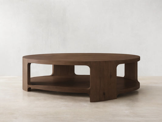 Front view of the Redding Round Coffee Table, a round table crafted from stained white oak, with a lower storage shelf.