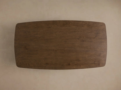Front view of the dark brown Redding Coffee Table, featuring a rectangular top, lower shelf, and rounded curved sides.
