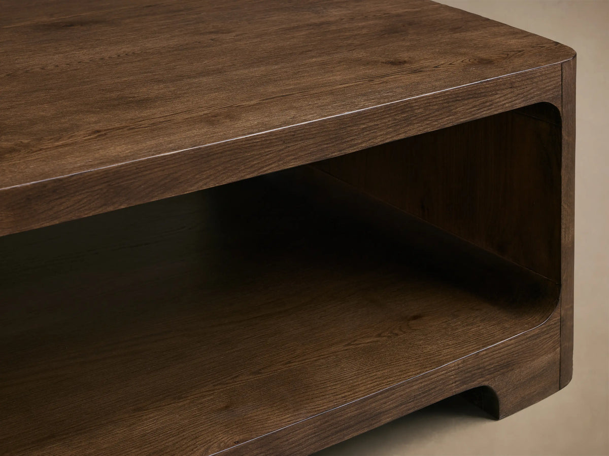 Top-down view of the Redding Coffee Table, featuring its rectangular shape with rounded corners and dark brown wood grain.