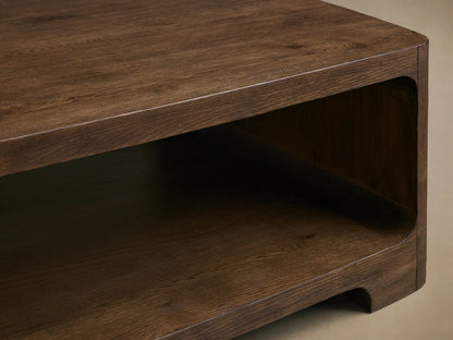 Top-down view of the Redding Coffee Table, featuring its rectangular shape with rounded corners and dark brown wood grain.