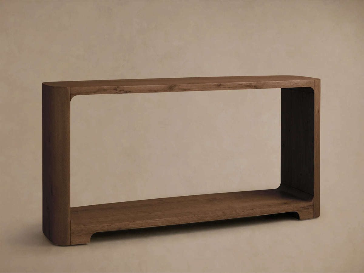 Front view of the brown Redding Console Table, crafted from oak with rounded corners and a lower storage shelf.